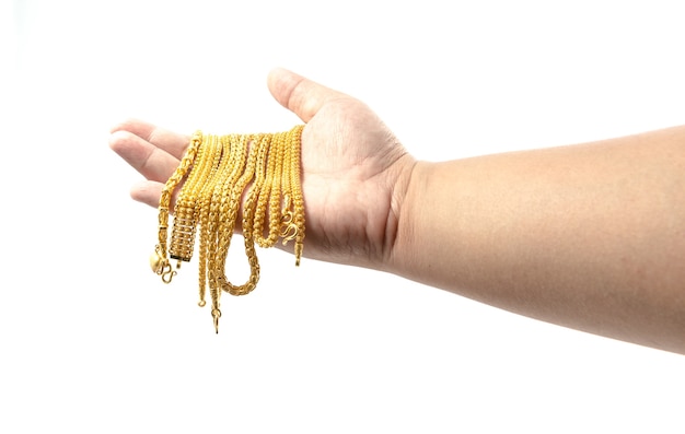 Hand Holding Expensive Gold Jewelry