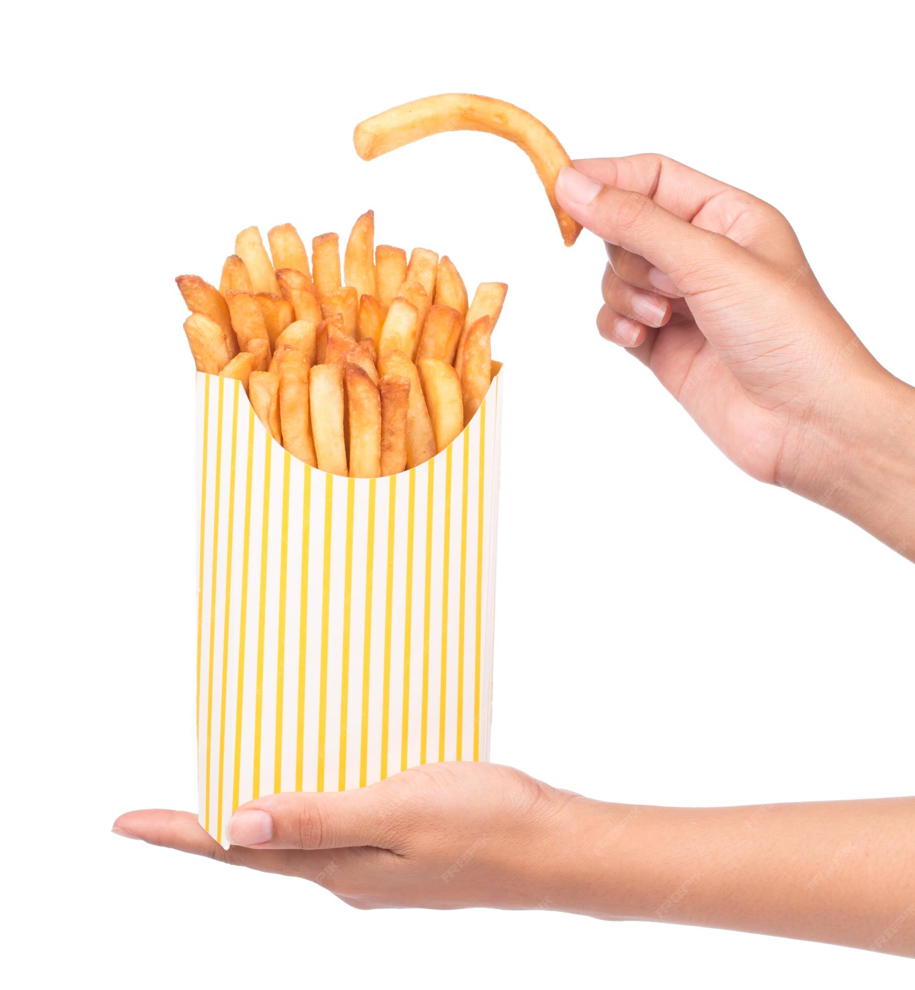 French Fries In The Paper Bag Isolated On White Stock Photo