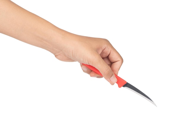 hand holding Fruit carving knife isolated on a white background