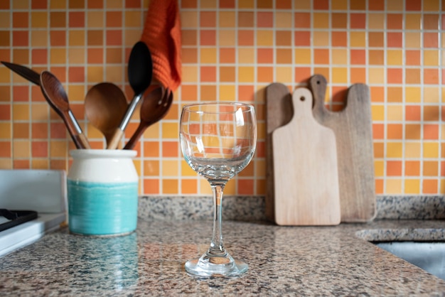 hand holding a glass of water