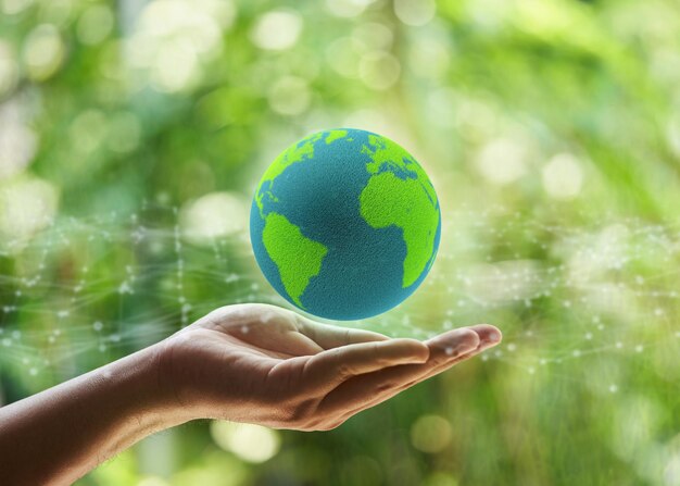 hand holding global icon ESG concept. Environment, society and governance business green background