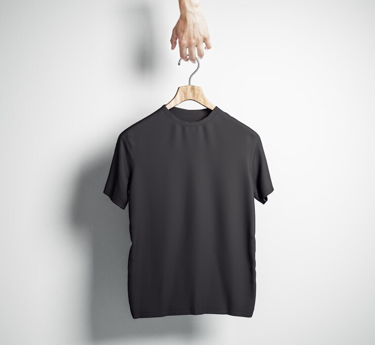 Photo hand holding hanger with empty black tshirt on concrete wall background design and shop concept mock up 3d rendering