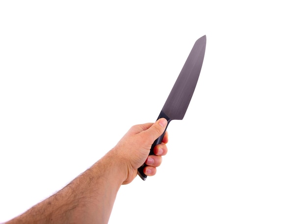 Hand holding a knife isolated on white