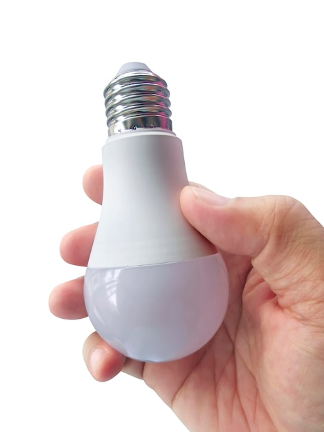 Hand holding light bulb isolated on white background