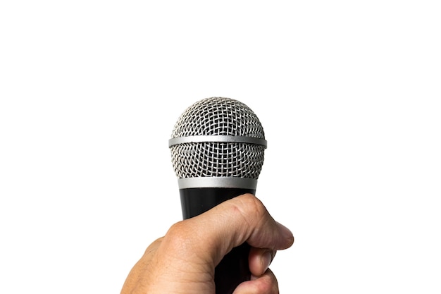 Hand holding a microphone isolated on white background