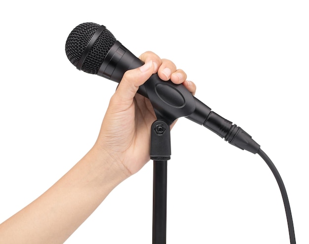 Photo hand holding microphone isolated on white background