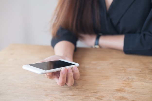 Hand holding mockup smart phone