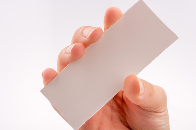 hand holding a note paper