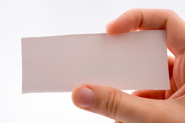 hand holding a note paper