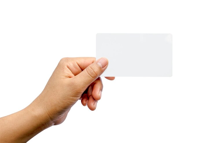Photo hand holding paper isolated on white with the clipping path.