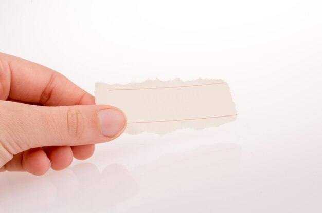 hand holding paper with attention wording