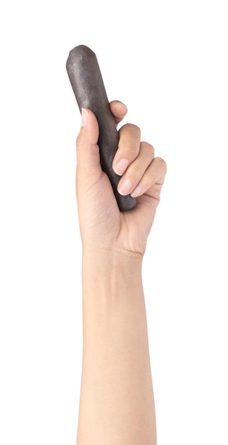 Photo hand holding pestle isolated on white background