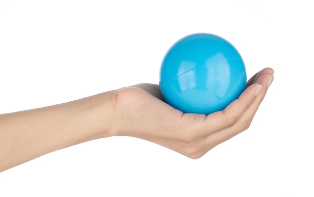 Hand holding Plastic Ball toy isolated on a White background