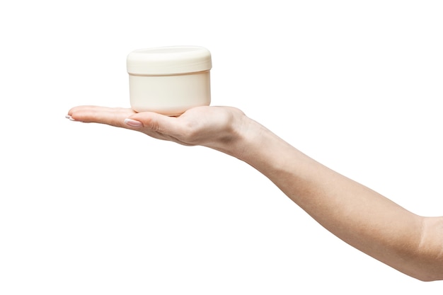 hand holding plastic can of cream Isolated  