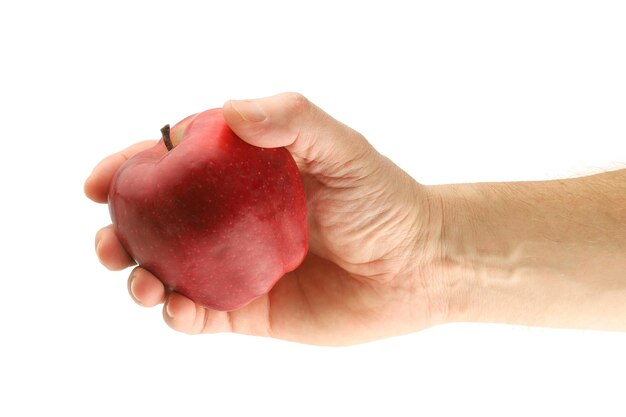 Hand holding red apple