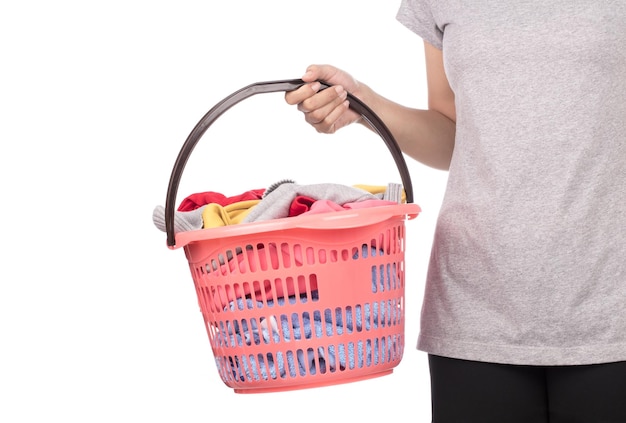 hand holding a red laundry basket isolated on white background