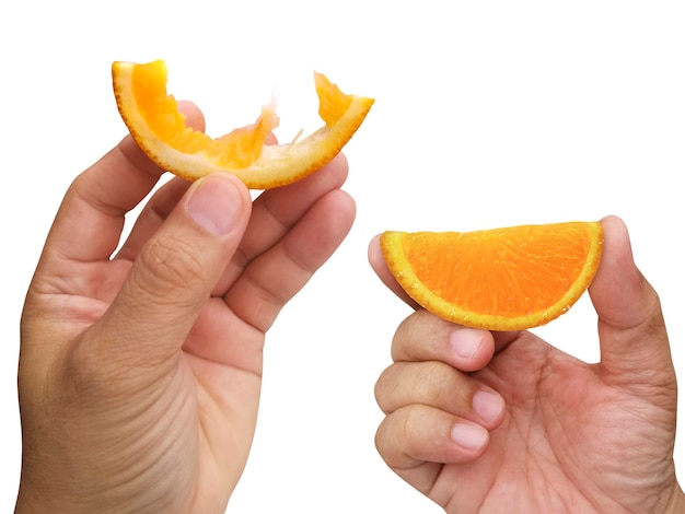 Hand holding slice of orange isolated on white background