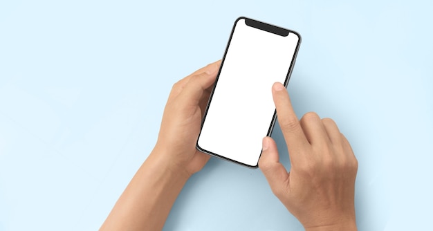 hand holding smartphone device and touching screen