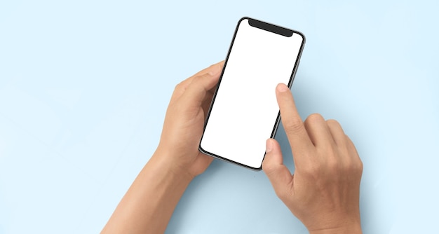スマートフォンデバイスを持って画面に触れる手