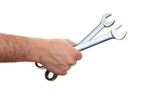 Photo hand holding spanners on white background