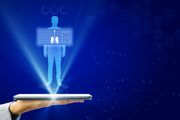 Hand holding tablet with abstract glowing blue medical lungs interface background with icons medicine and innovation concept