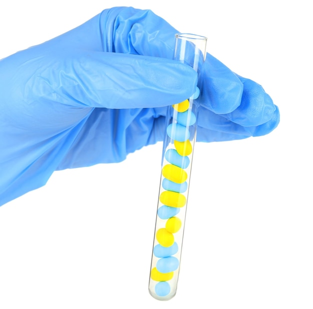 hand holding test tube with different color drugs isolated on white