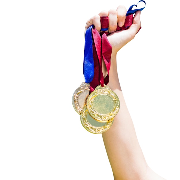 Photo hand holding three medals