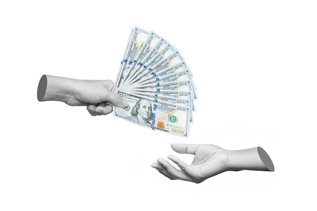 Photo the hand holding wad of hundred-dollar cash bills passing it on to another person. transfer of money