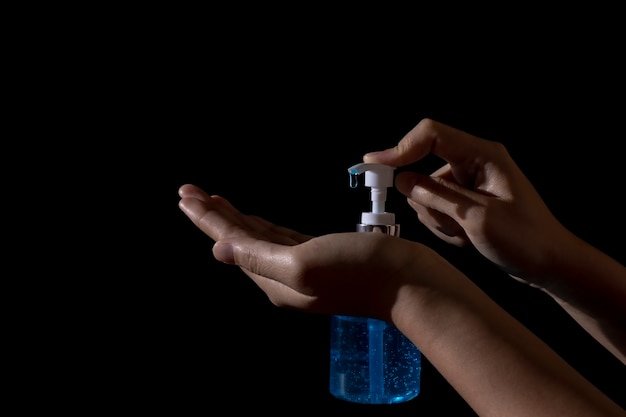 hand holding washing with alcohol