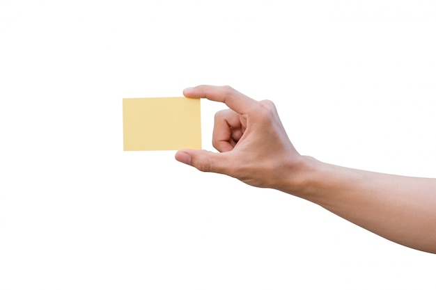 Hand holding yellow paper isolated on white