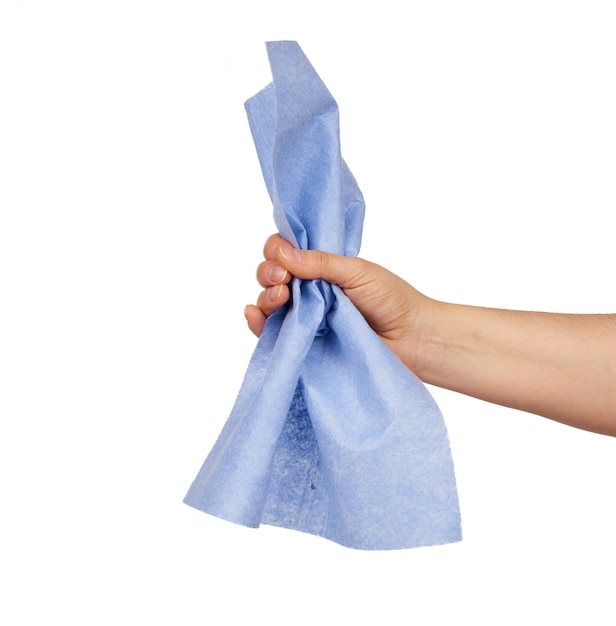 Hand holds a blue rag sponge for cleaning