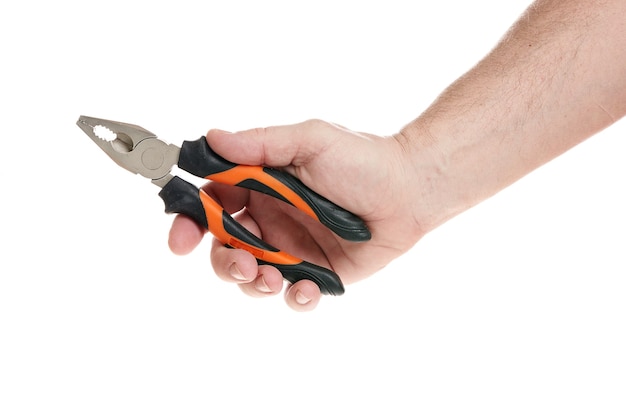 Hand holds pliers on a white background a template for designers