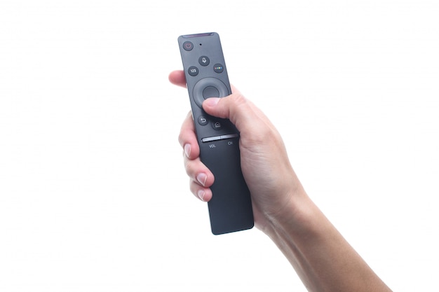 Hand holds tv remote isolated