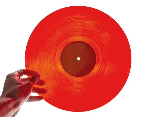 hand holds a vinyl record