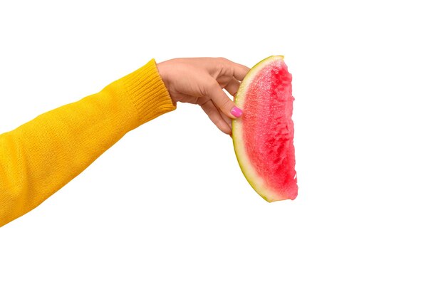 Hand holds watermelon slice isolated on white background Summertime concept