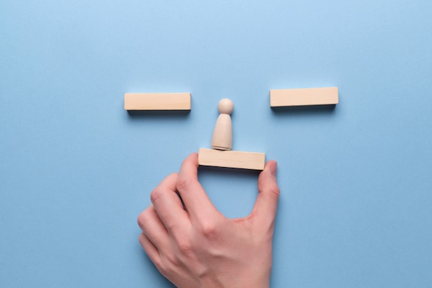 Hand holds wooden blocks