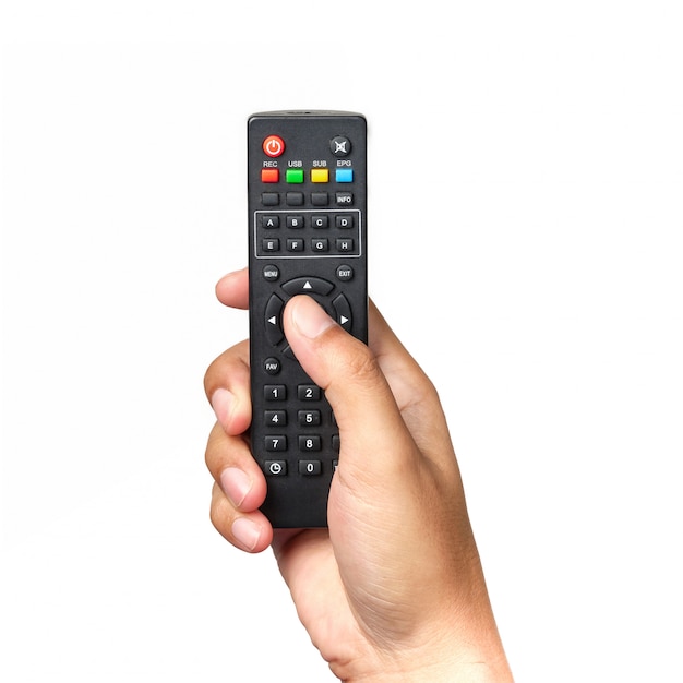 Photo hand is holding television remote control and pressing buttons isolated