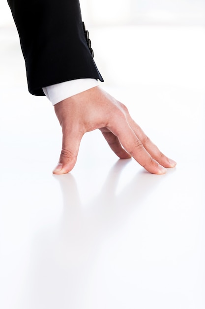 Hand of legacy. Cropped image of human hand leaning at the table