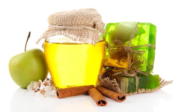 Hand made soap and ingredients for soap making isolated on white