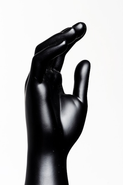 hand of male black mannequin on a white