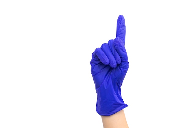 Hand in medical rubber glove pointed up gesture, isolated on a white background photo