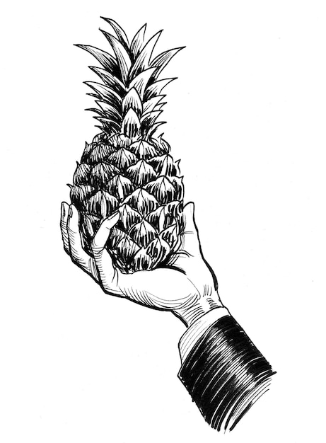 Foto hand met ananasfruit. inkt zwart-wit tekening