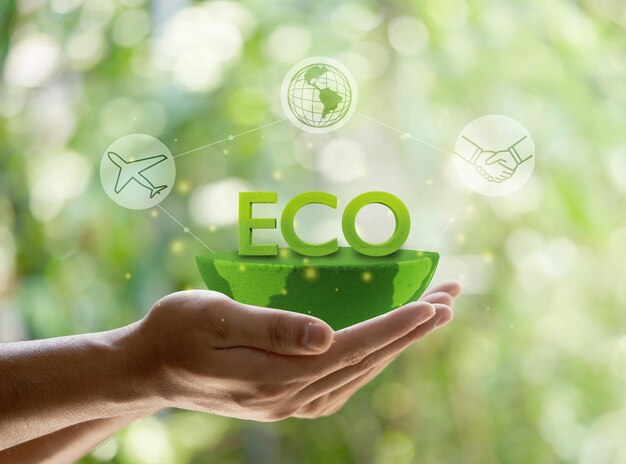 hand met ECO pictogram concept. Milieu, samenleving en governance op groene achtergrond.