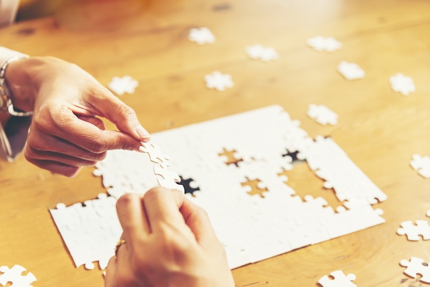 Hand met legpuzzels, Business partnerschap concept.