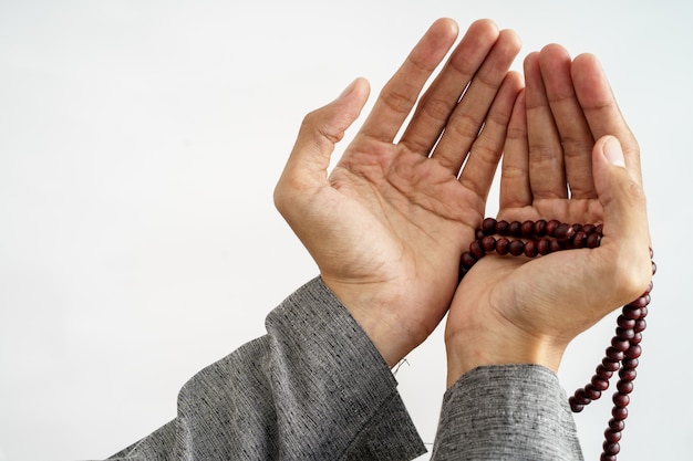 Photo hand open arm while pray in islamic culture