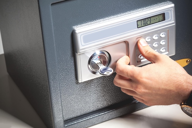 Hand opened a safe close up