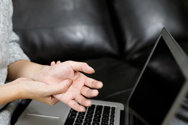 Hand pain women muscle pain while working at the computer