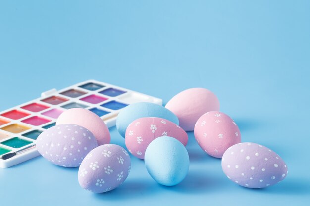 Photo hand painted easter eggs in pastel colors