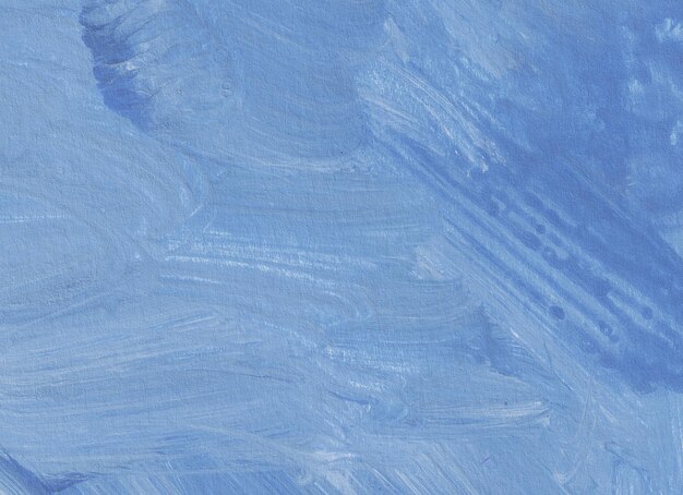 hand painted paper with blue paint and loose brush strokes