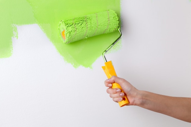 Hand painting wall in green color